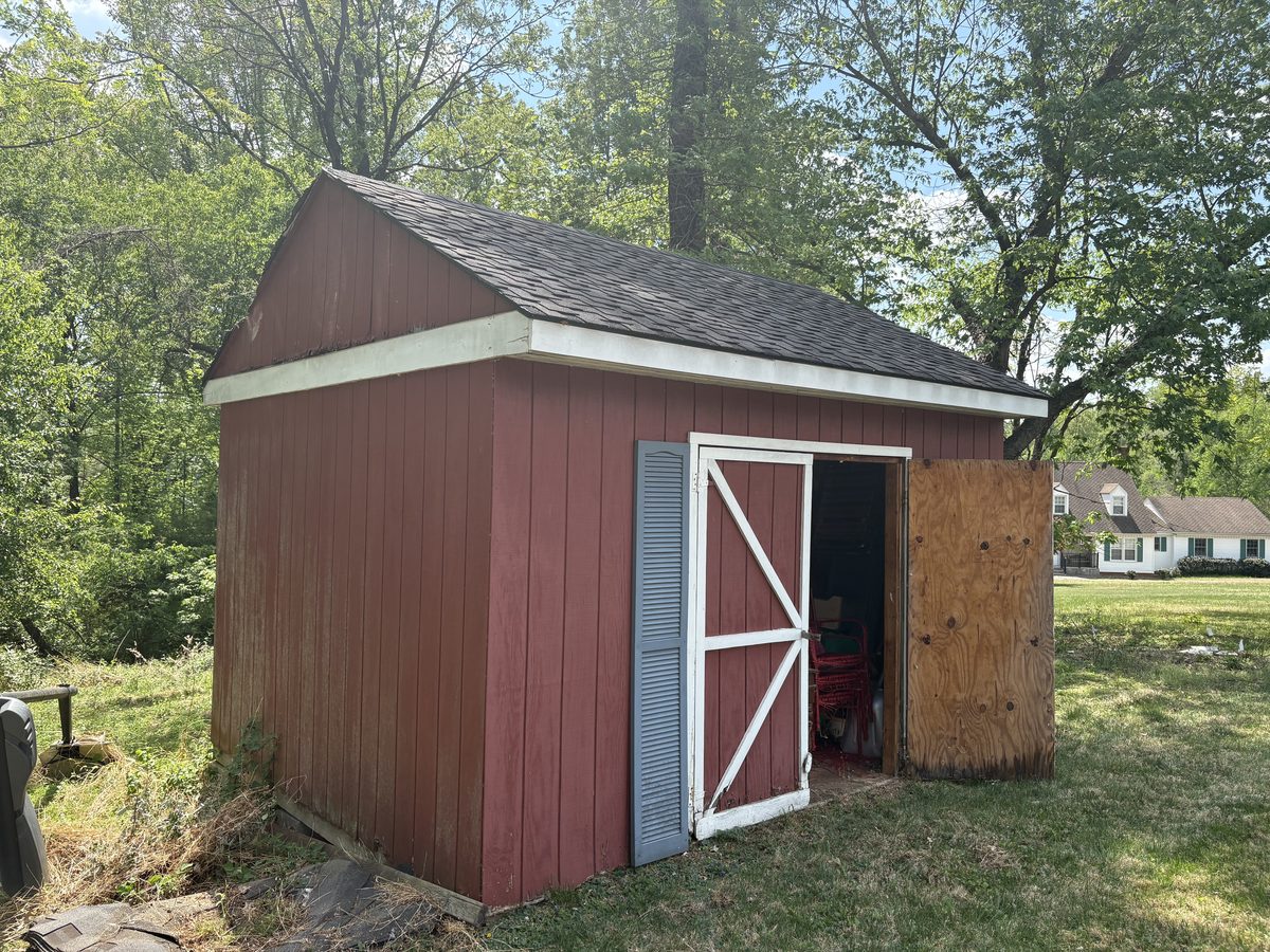 Red shed before demolition Charlottesville VA — Albemarle Moving